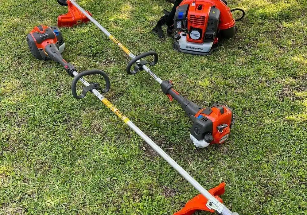 Professional Lawn Care Tools laying on grass