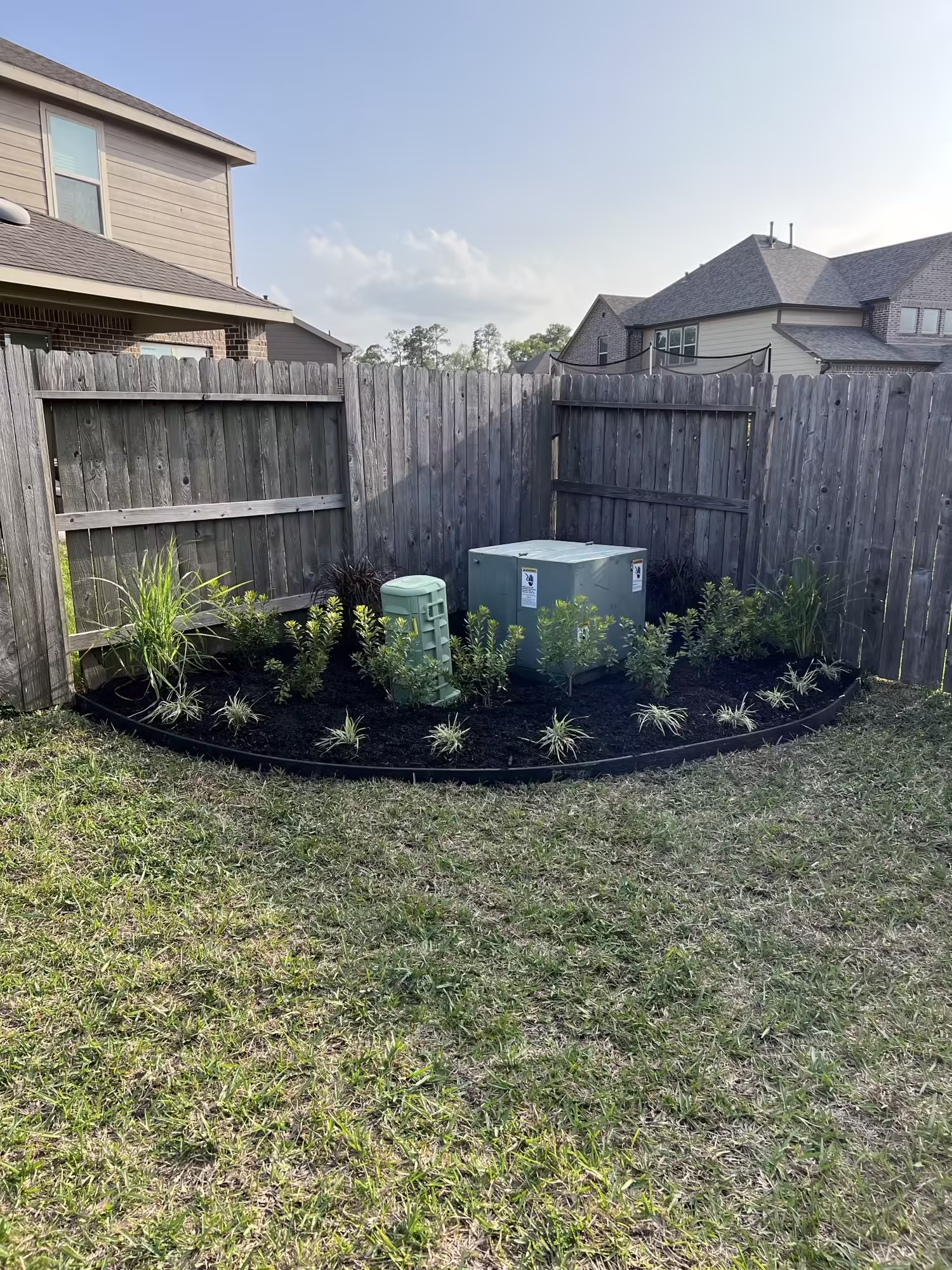 Clean, well-maintained Houston backyard — safe outdoor space for young families