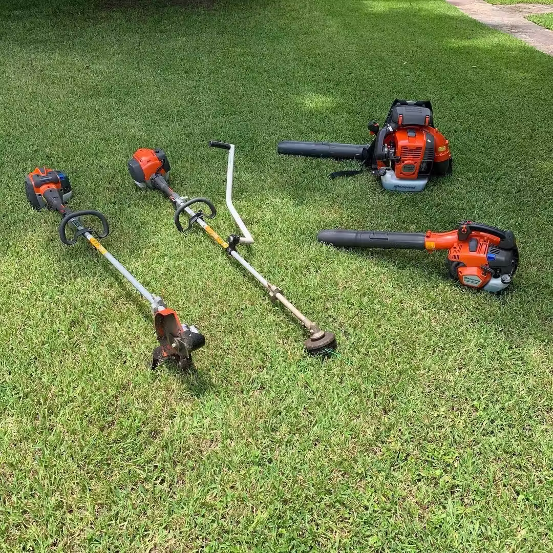 Professional lawn care equipment used by Evergreen Outdoor Services in Houston