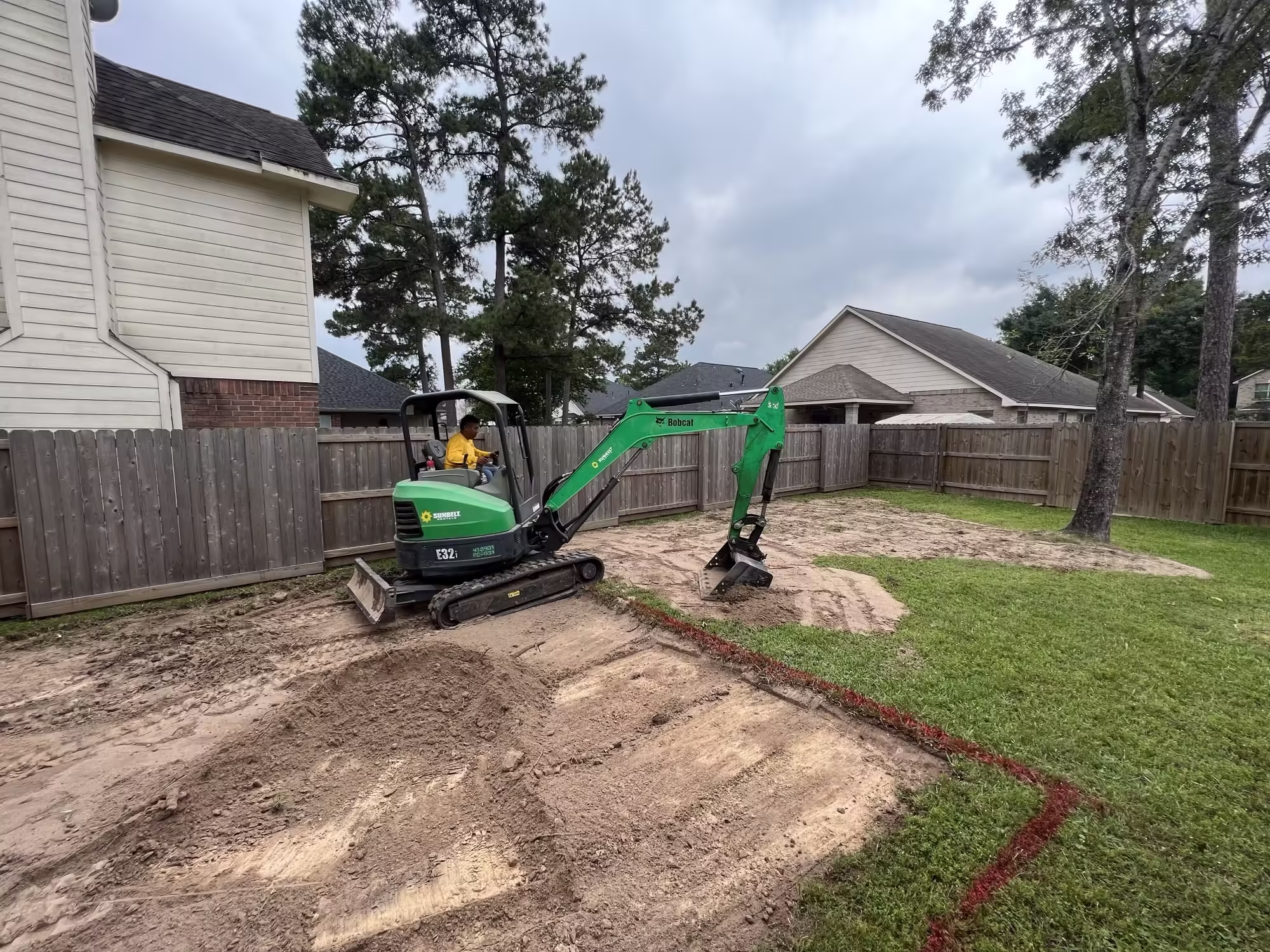 Residential excavation and grading work by Evergreen Outdoor Services in Houston