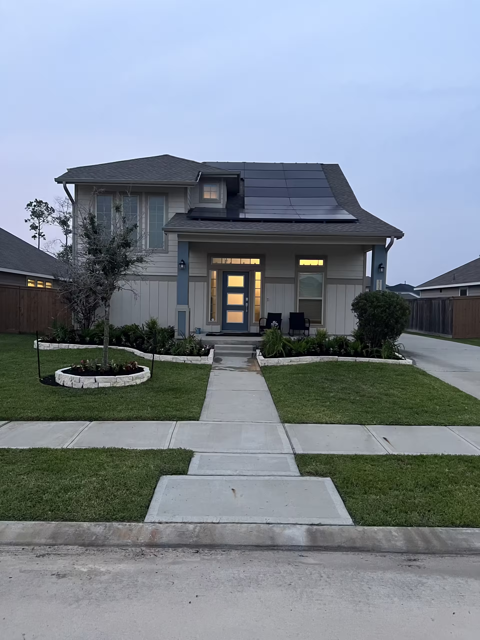 Front garden and stone border installation at Houston home