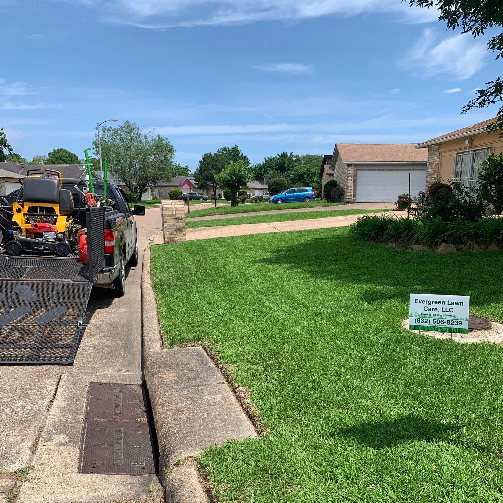 Freshly mowed lawn after professional lawn care service in the Sheldon area, showcasing clean and even grass