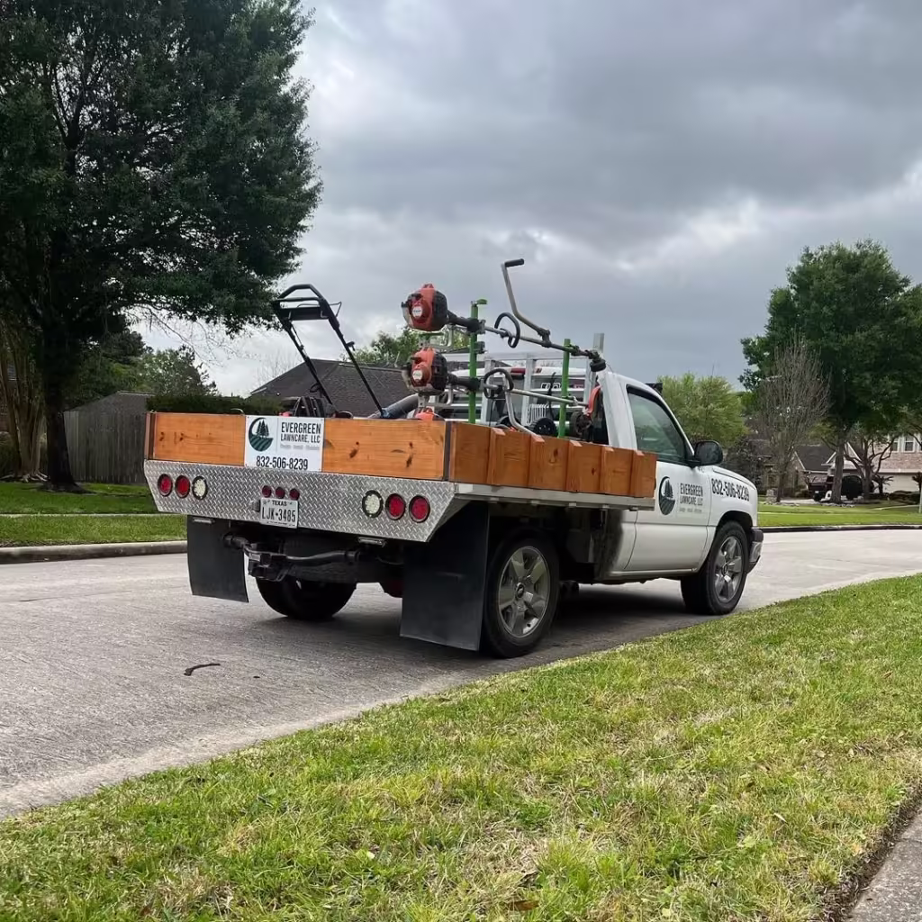 Professional lawn care truck setup in early spring