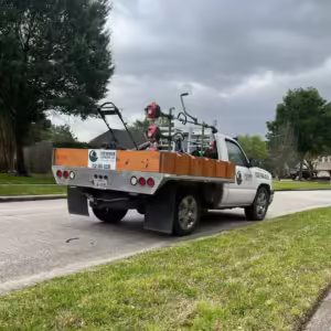 Professional lawn care truck setup in early spring