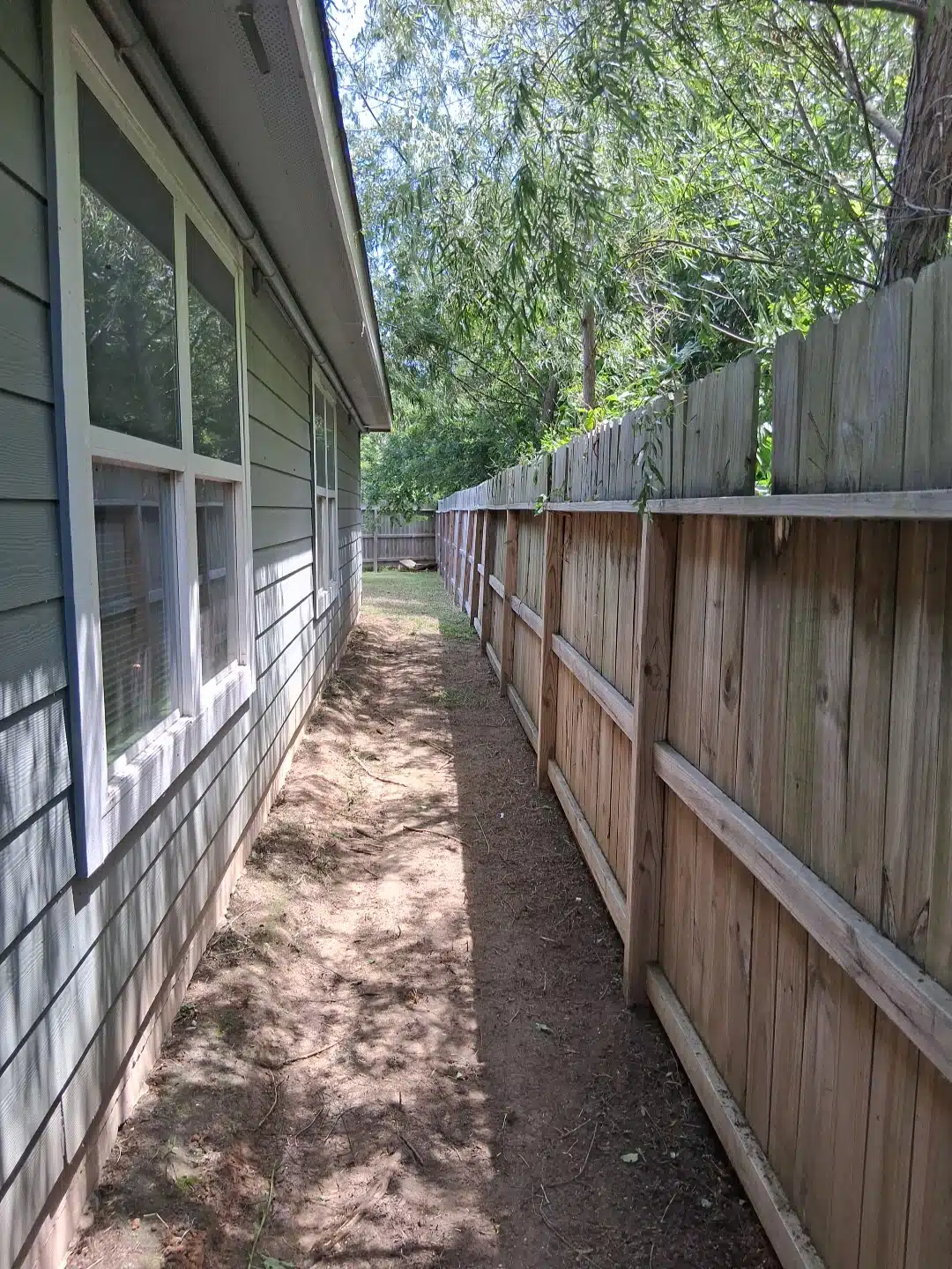 Backyard after Evergreen completed property cleanup work at the same Houston townhome