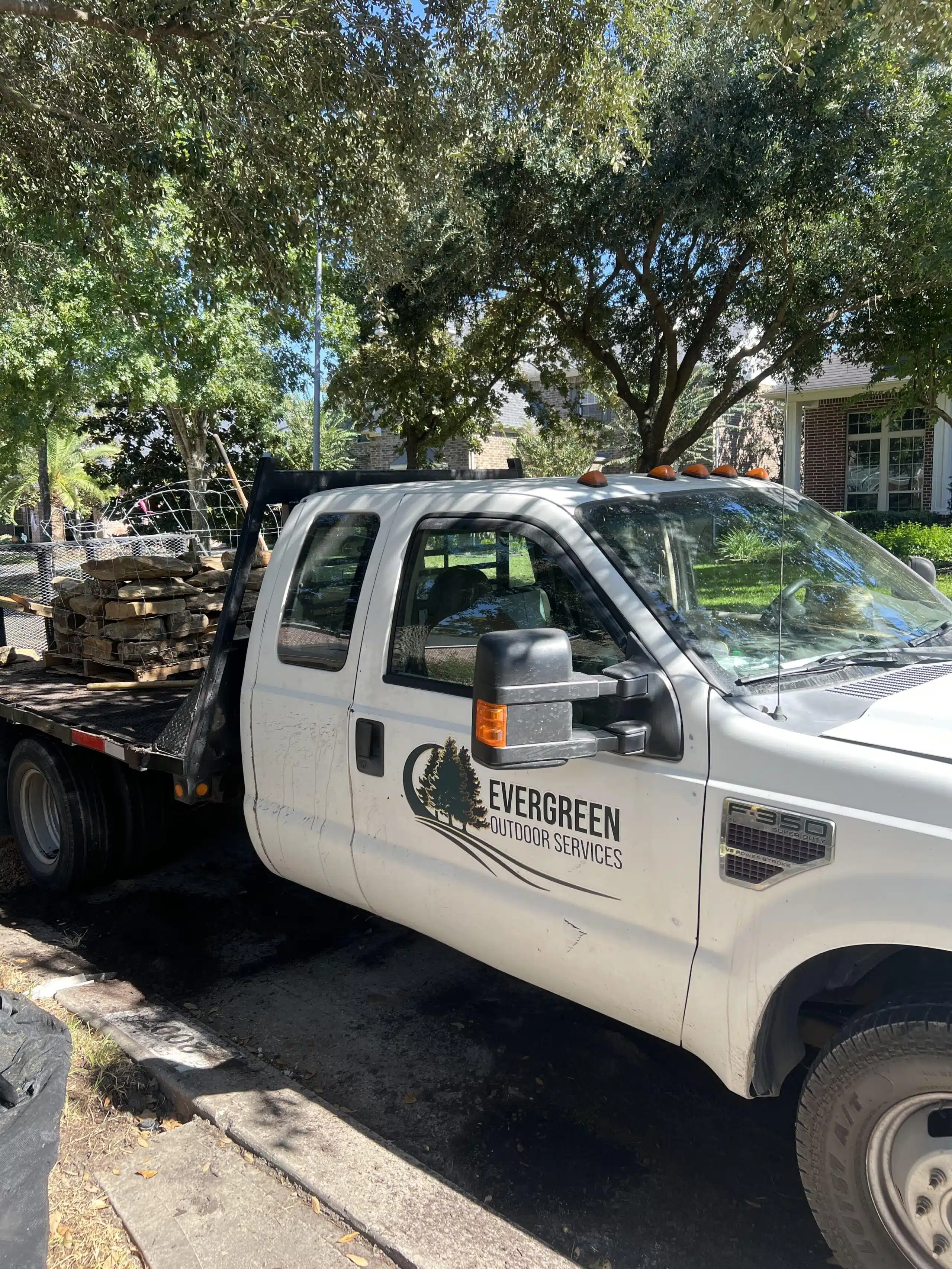 Evergreen Outdoor Services Houston Professional Landscaping Truck and Equipment
