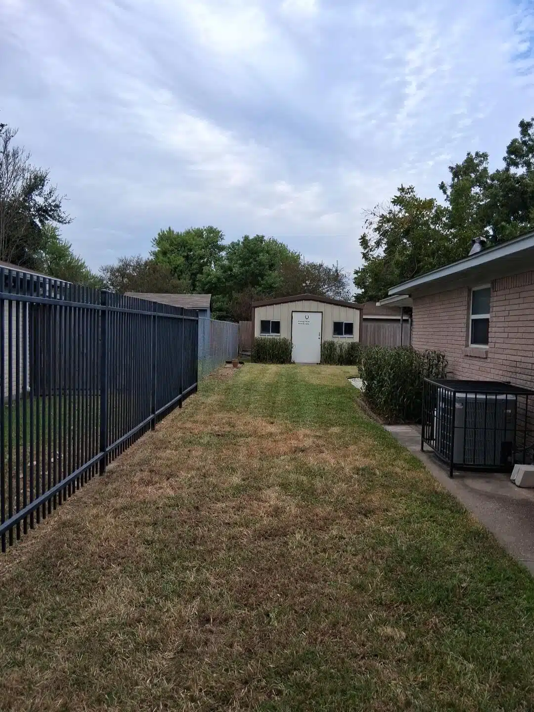After: clean, safe Houston side yard following professional cleanup