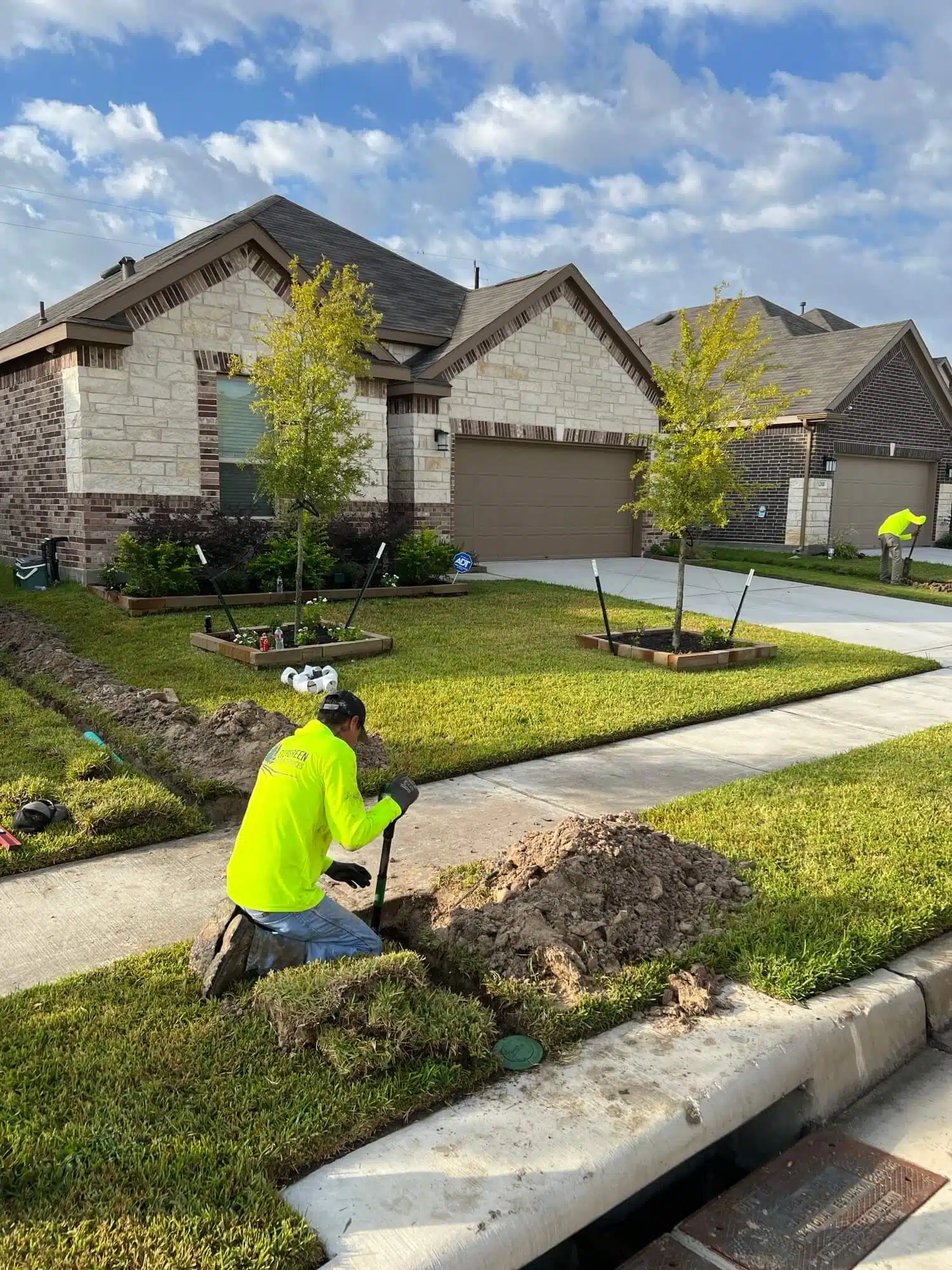 Front yard trenching for Houston drainage pipe installation