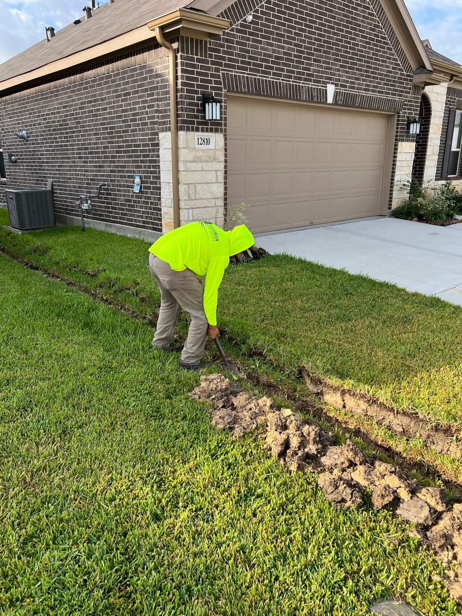 Drainage installation service in Kingwood to redirect water away from a Houston area yard