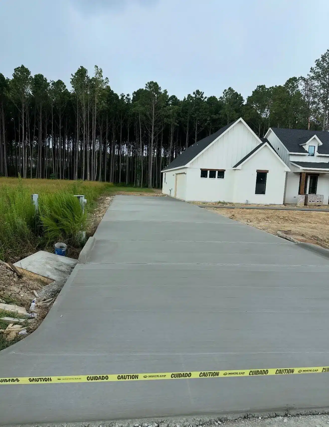 Finished concrete driveway extension in Houston