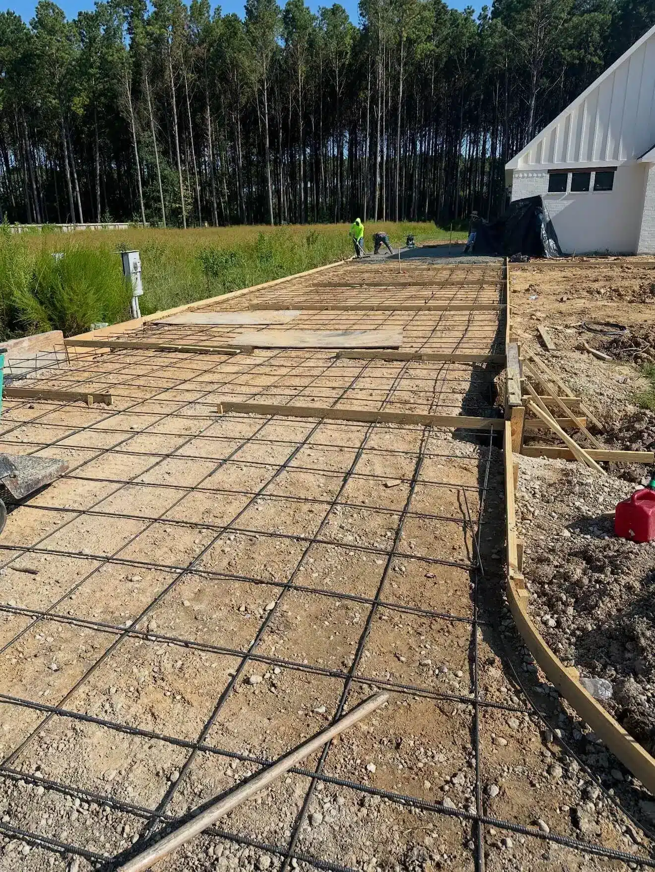 Driveway area before a concrete installation project in Houston