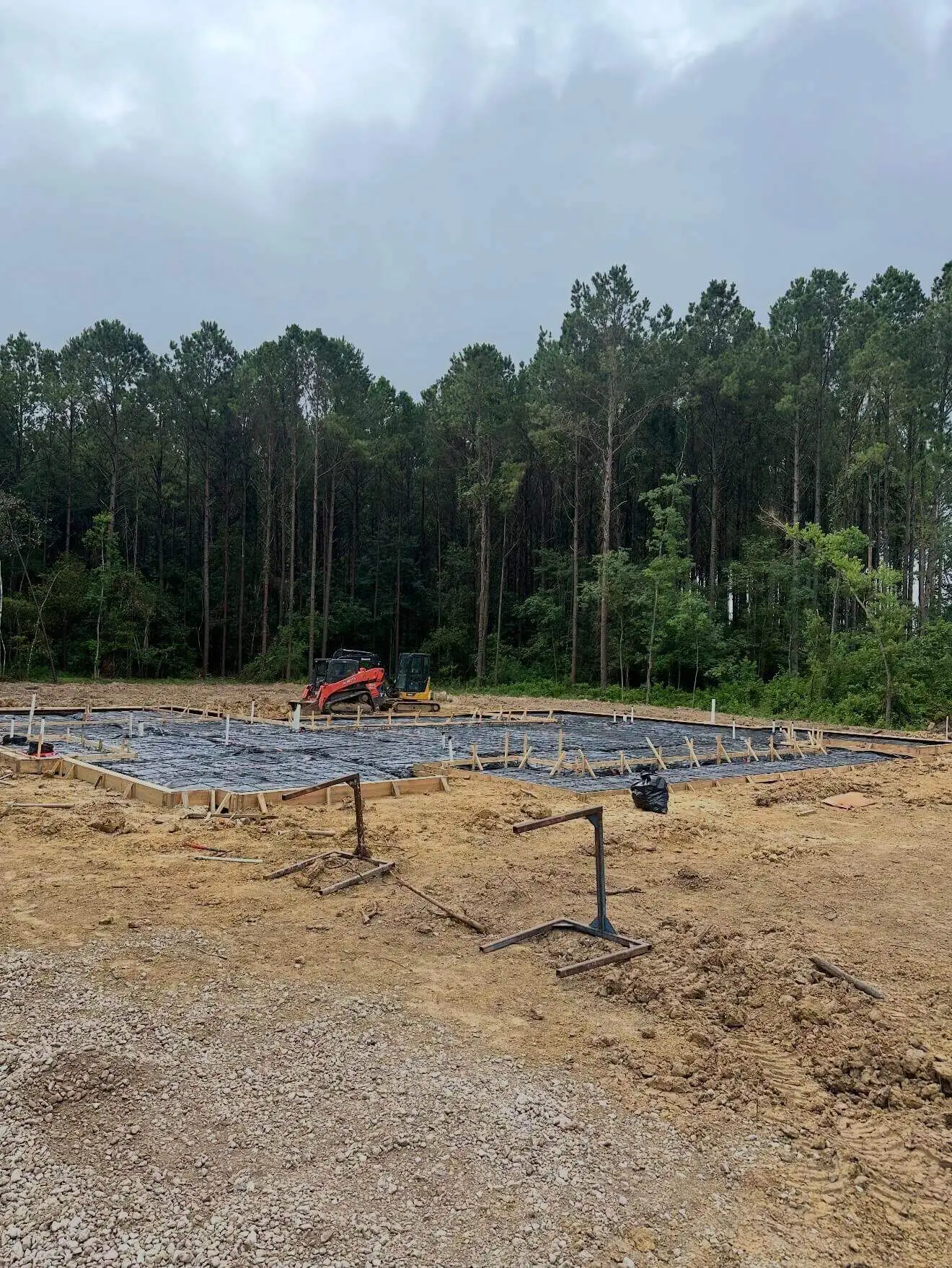 Concrete foundation and pad work for outdoor property improvement