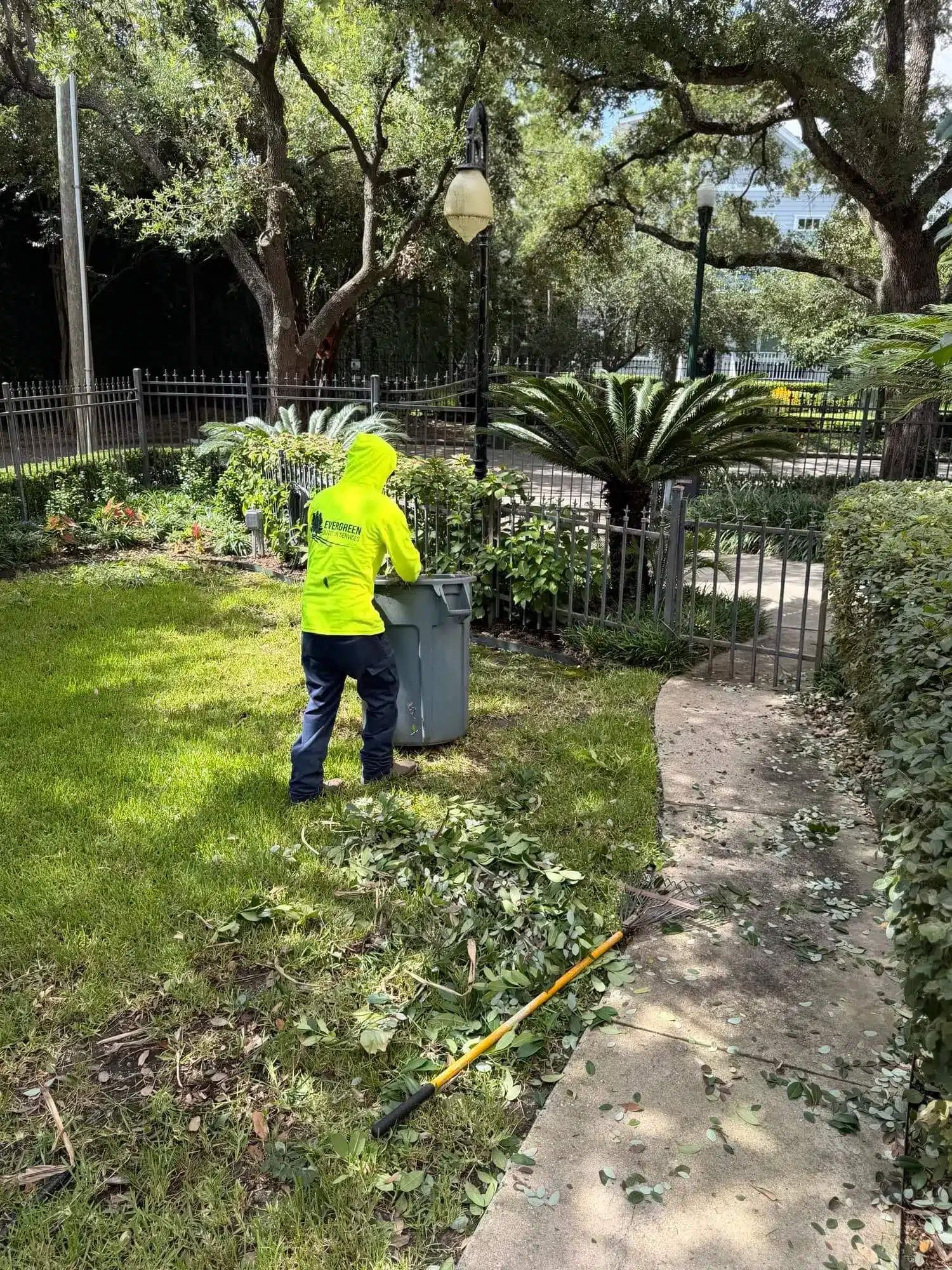 Houston yard and garden cleanup with cleared debris and maintained landscape before hurricane season